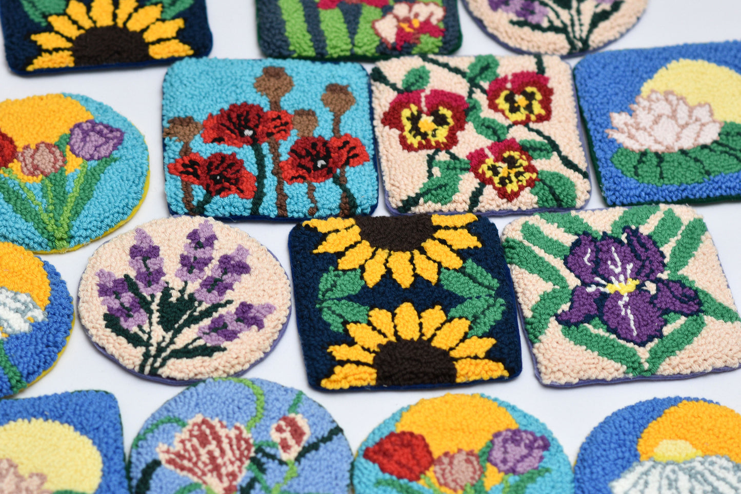 Collection of floral-patterned coasters on a white background