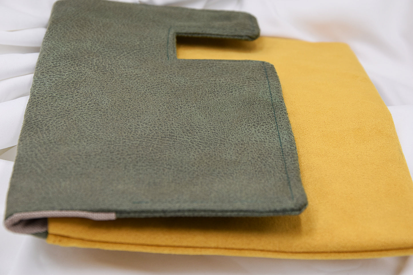 Asymmetric clutch bag / Green recycled leather and mustard yellow suede