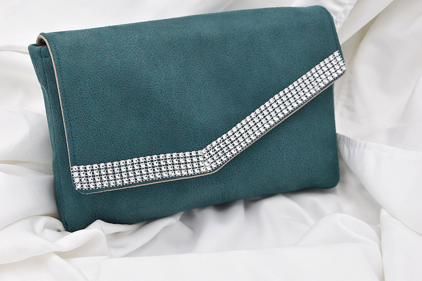 Green faux leather clutch bag with rhinestone effect shiny band