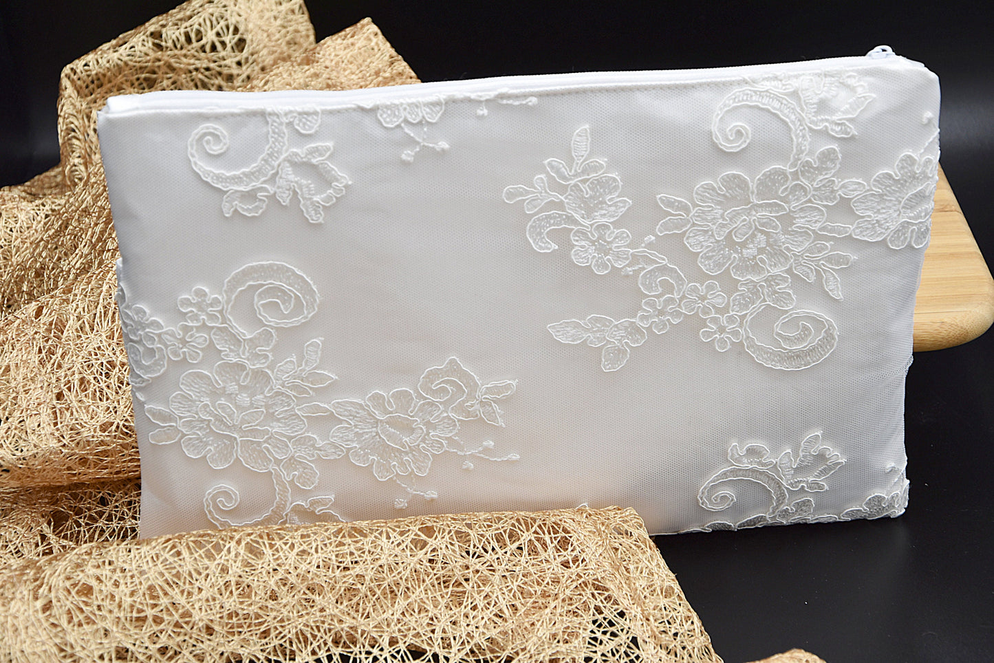 Bridal clutch bag in white lace with rhinestone brooch