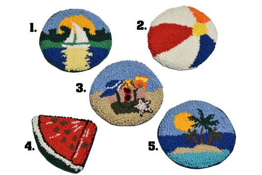Five colorful rug pads with beach-themed designs on a white background