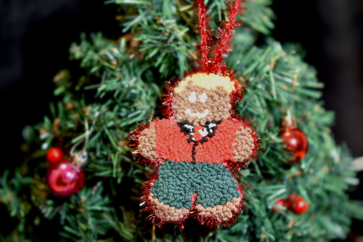 Christmas Punch needle ornaments - Gingerbread man hanging on a Christmas tree