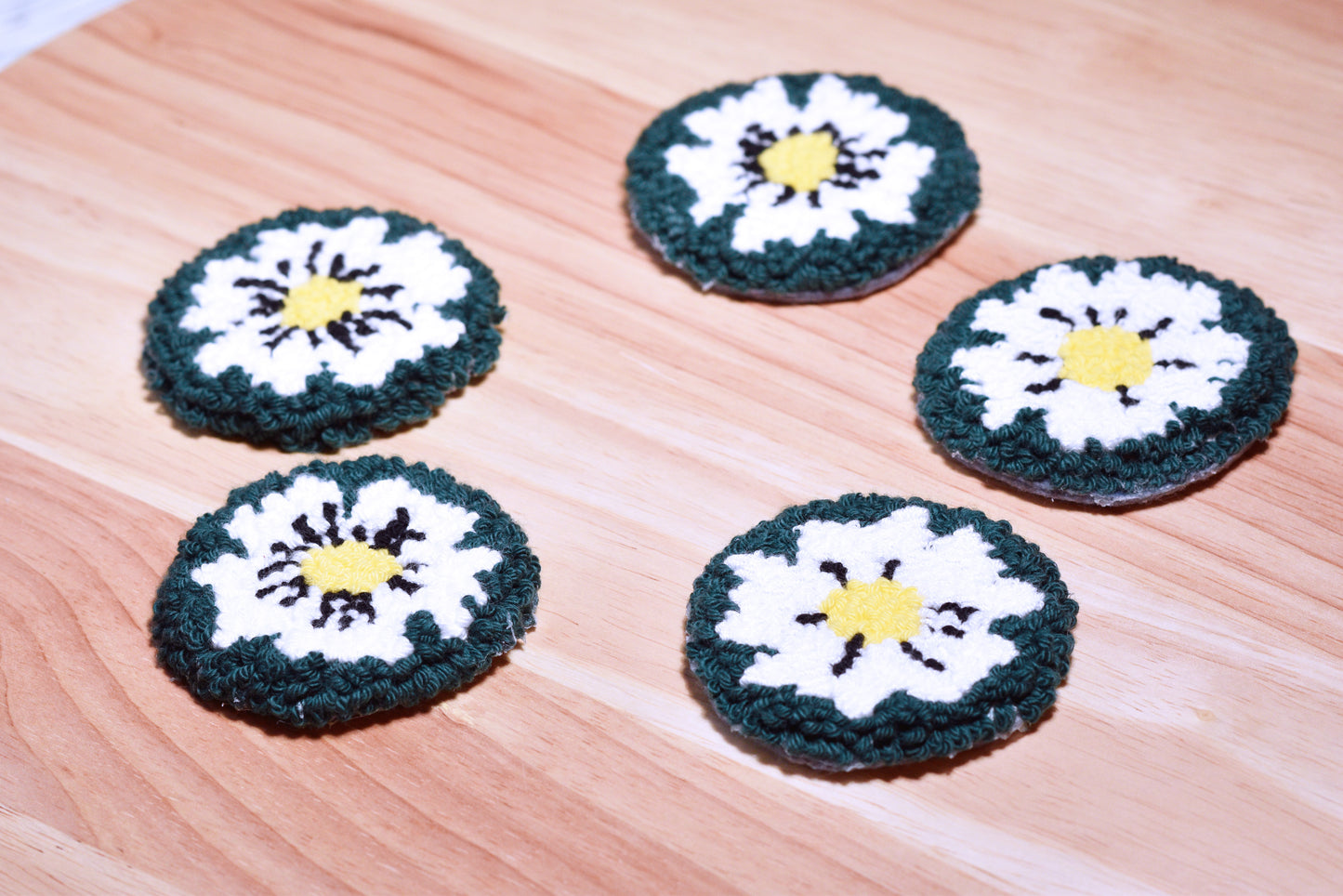 Punch needle car coaster- White on green daisy