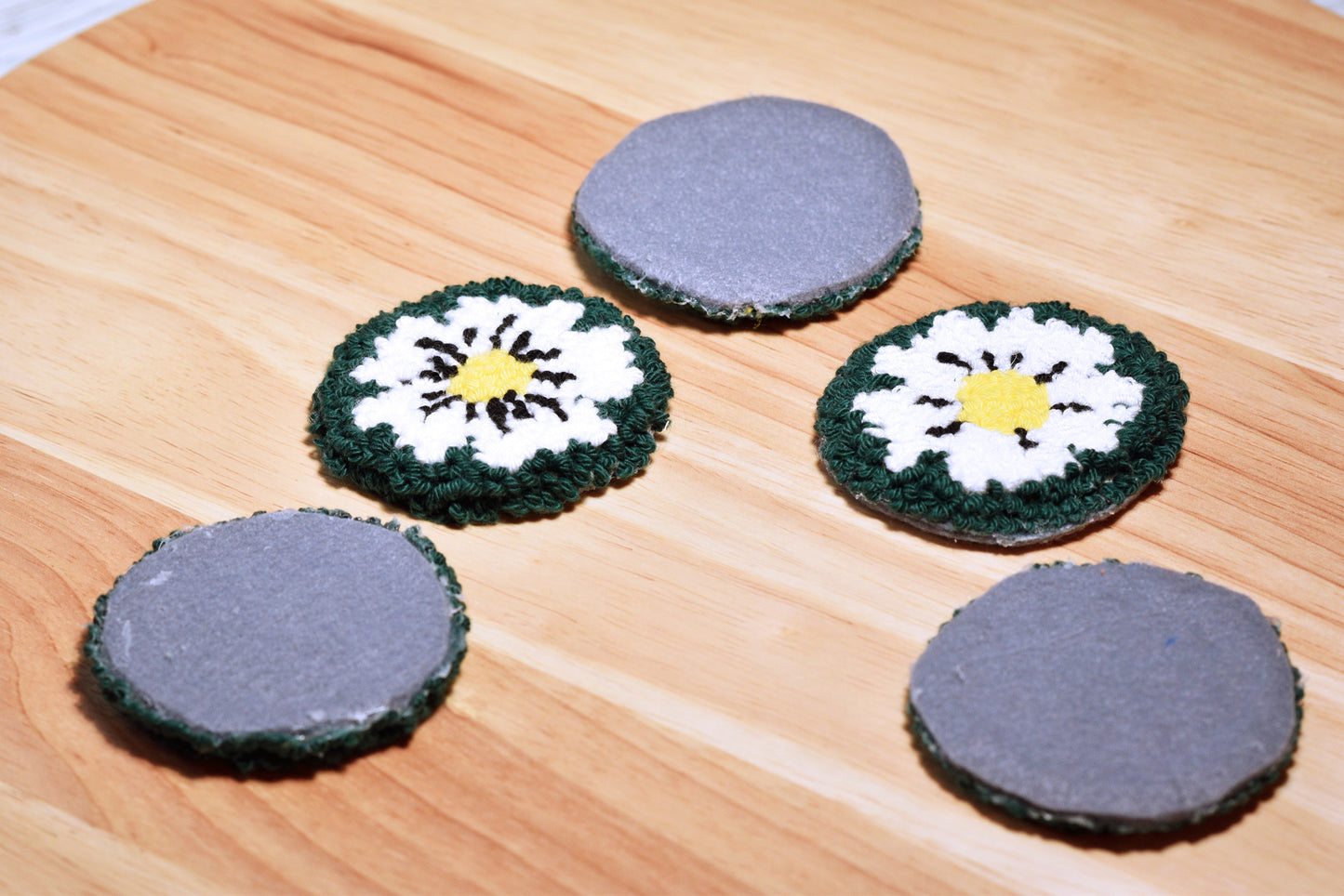 Punch needle car coaster- White on green daisy