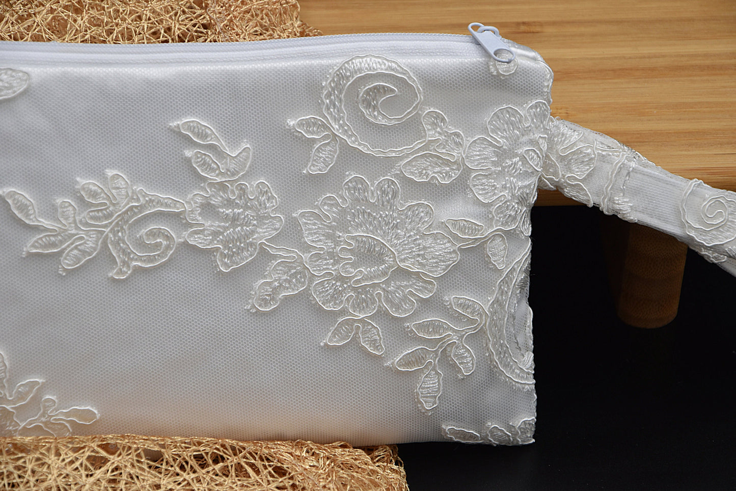 Wristlet lace bridal bag with a zipper