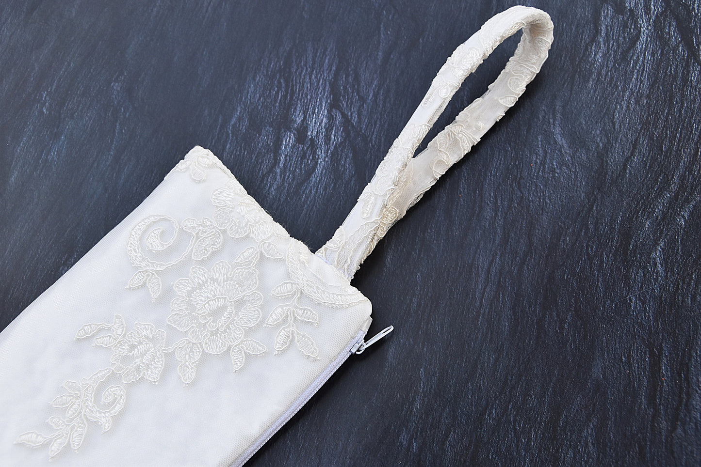 Wristlet lace bridal bag with a zipper