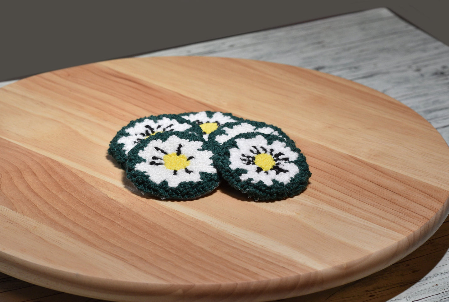 Punch needle car coaster- White on green daisy