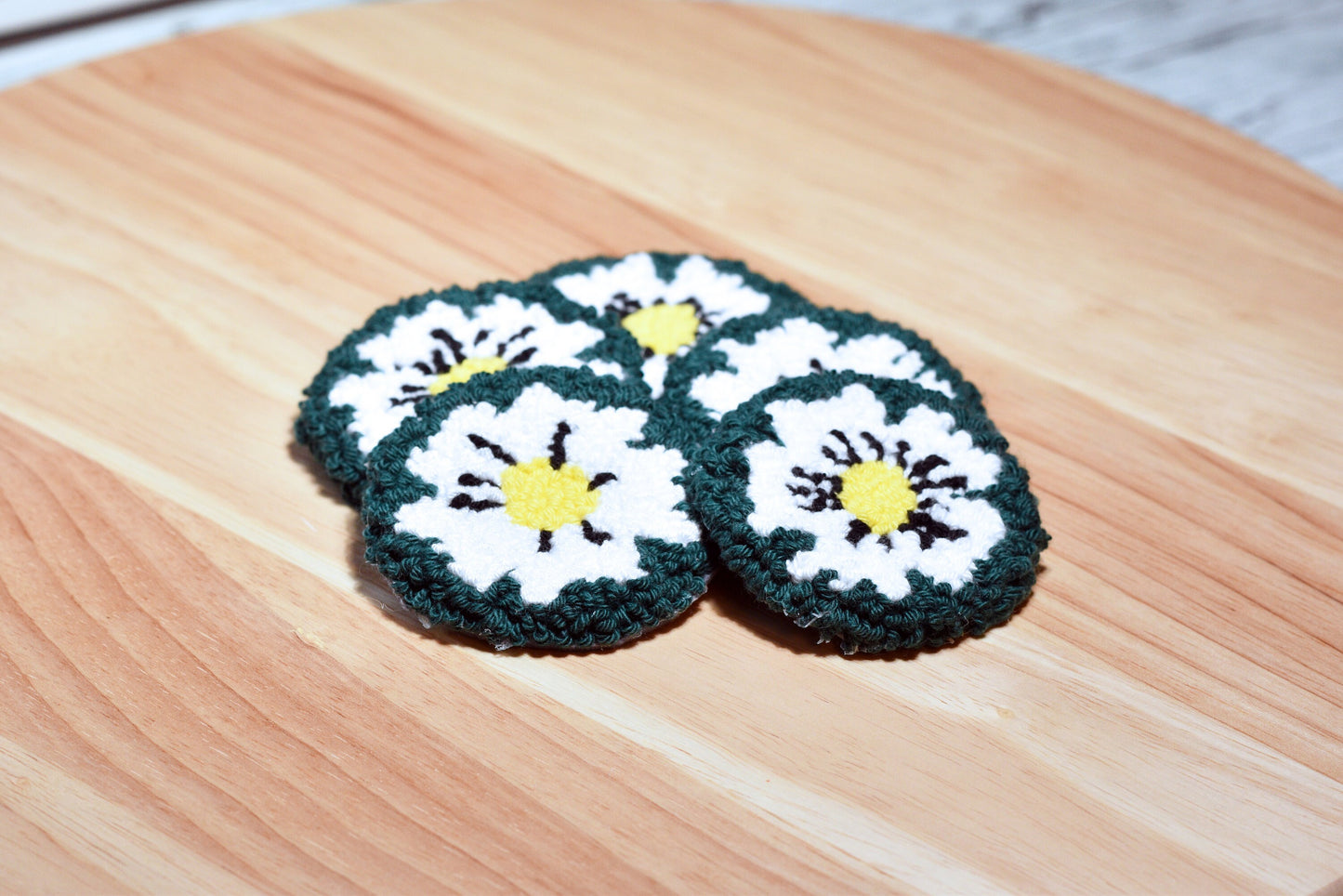 Punch needle car coaster- White on green daisy