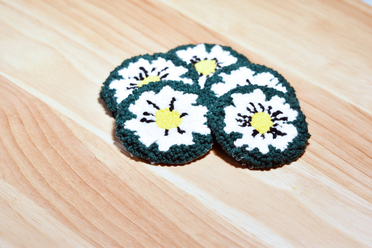 Punch needle car coaster- White on green daisy