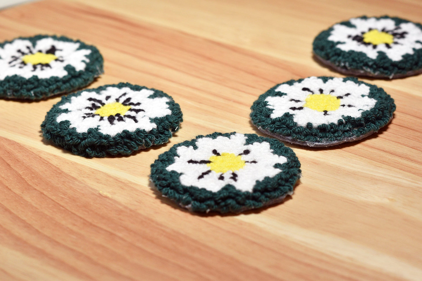 Punch needle car coaster- White on green daisy